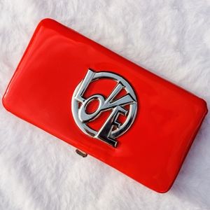 "love" clutch bag